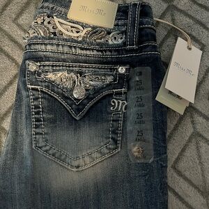 - New with tags, size 25 curvy straight legs Miss me jeans